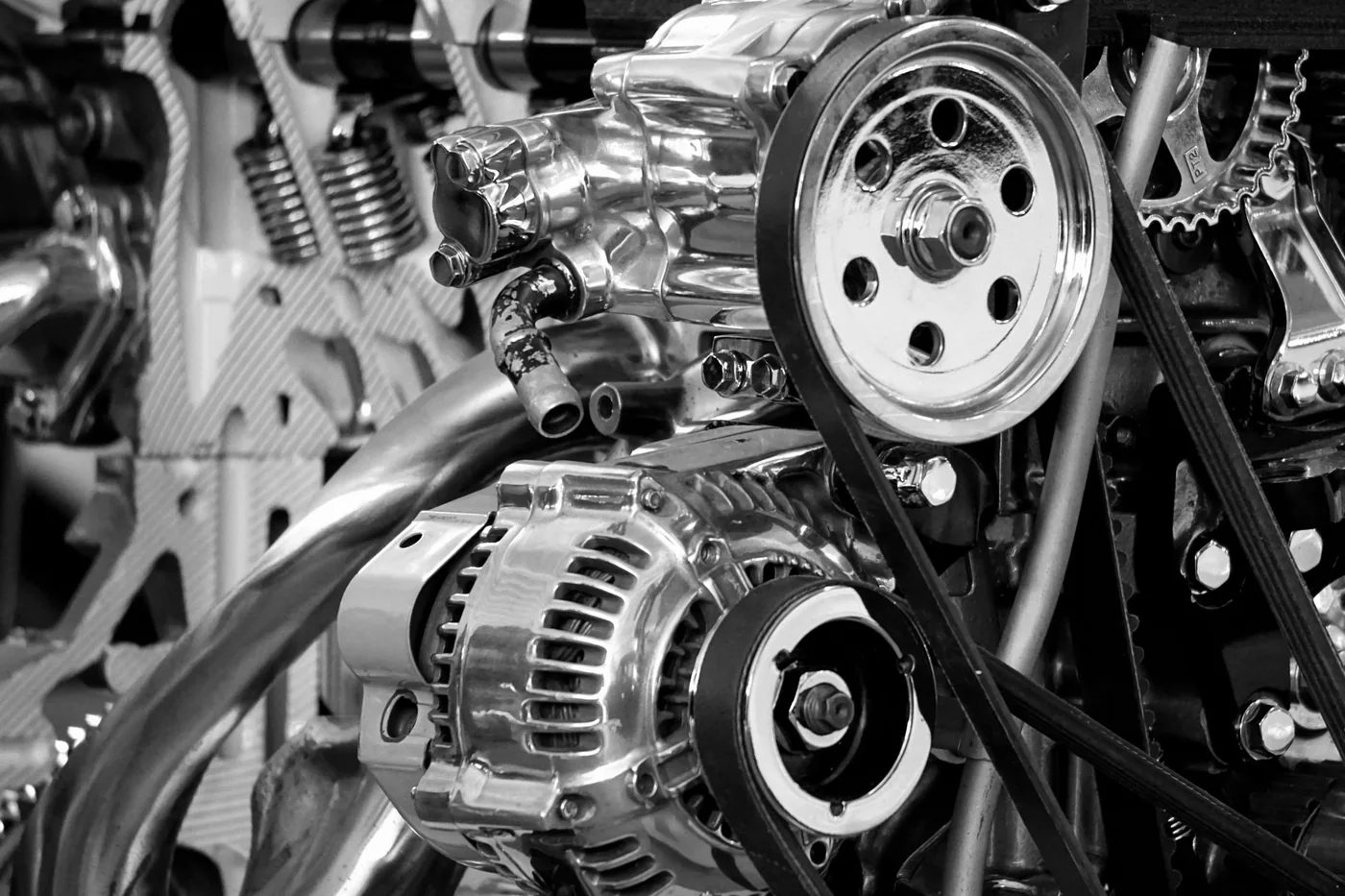 Close-up of an electric motor with visible stator windings and connected power leads.